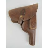 A brown leather Polish Vis Random holster with magazine.