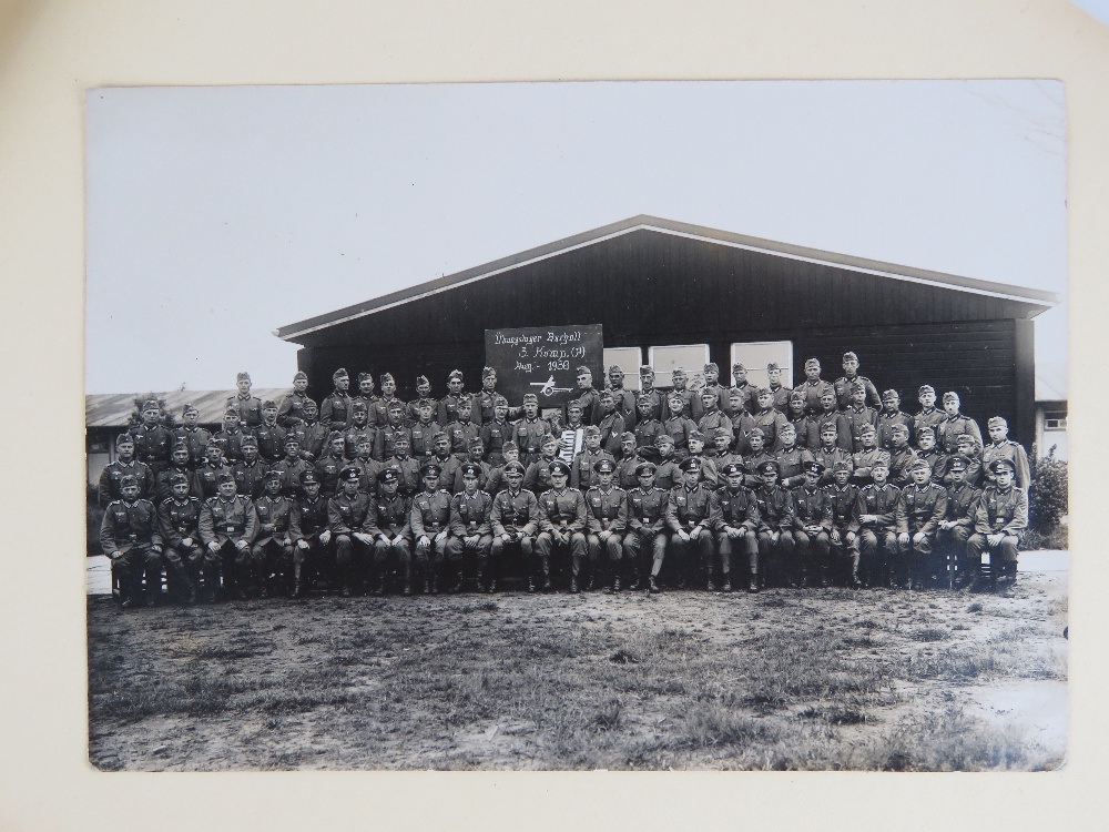 A WWII German straw marquetry photograph album including photos of artillery,