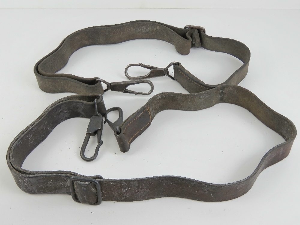 A pair of black leather WWII German MG34/42 lafette carry straps, late war production.