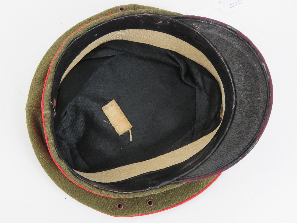 A WWII Japanese Army peaked cap, label within. - Image 3 of 5