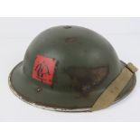 A WWII British Royal Artillery anti-battery helmet dated 1939, made by Joseph Sankey & Sons.