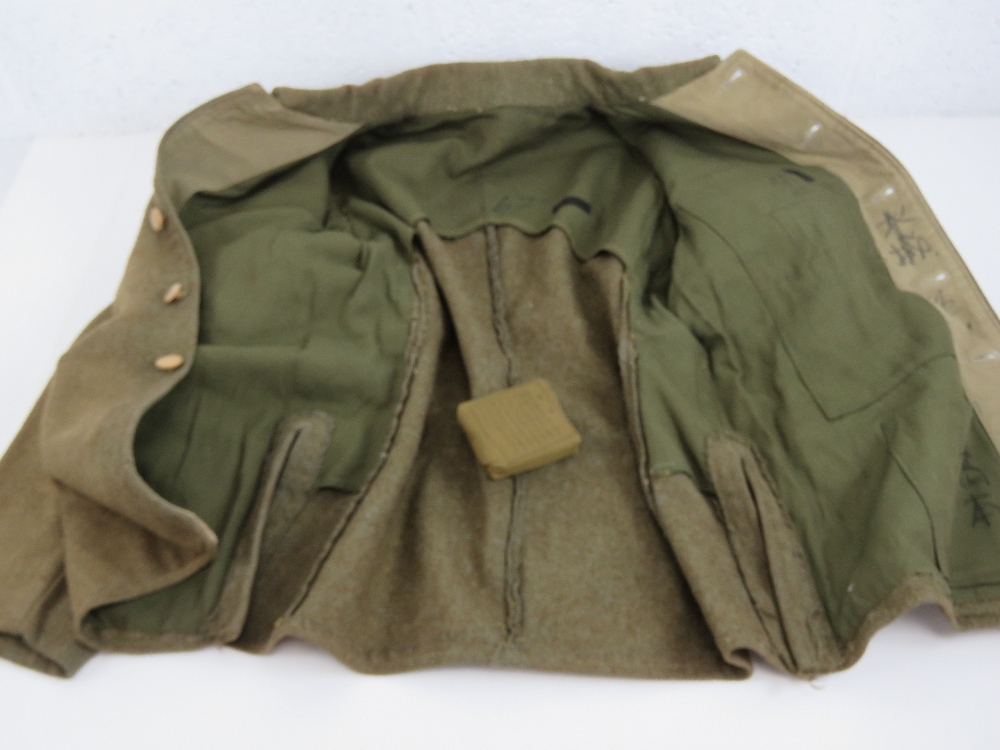 A WWII Japanese army tunic with ranking insignia upon, having packet within inside pocket. - Image 4 of 8