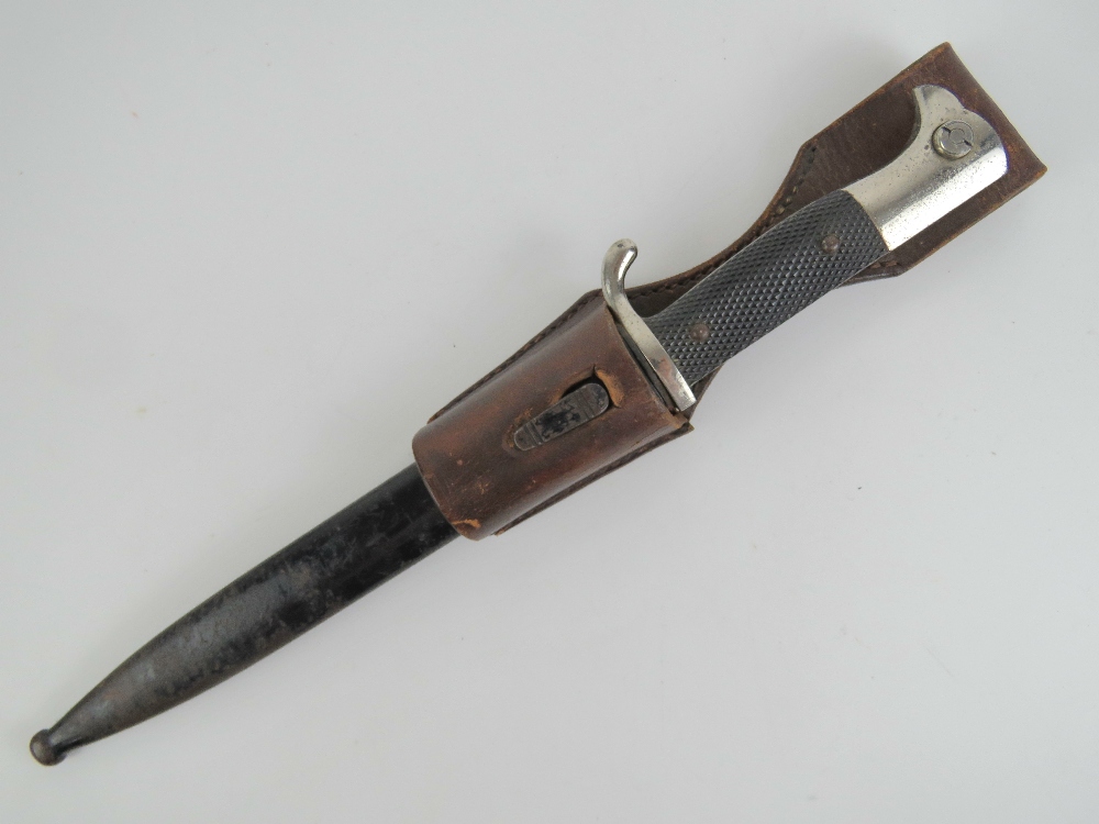 A WWI German parade bayonet having 19cm engraved blade marked F.W.