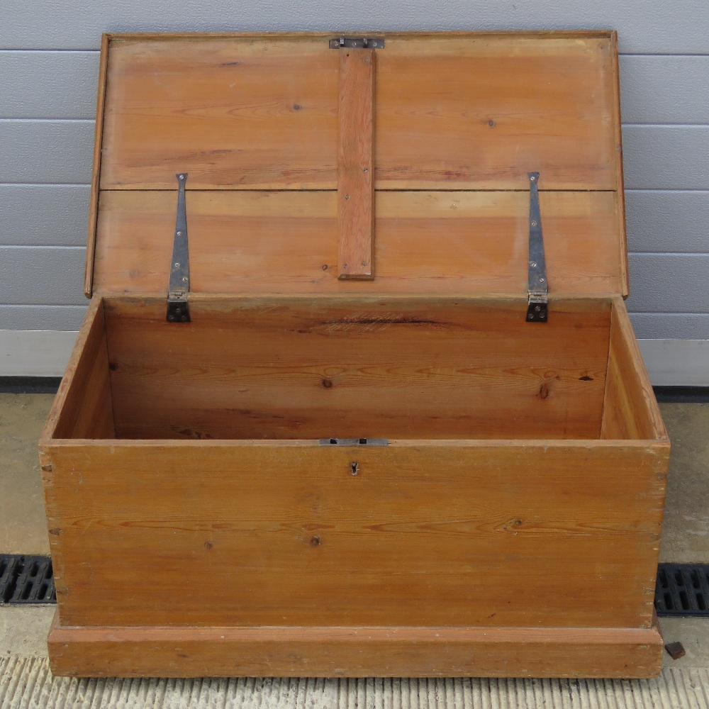 A late 19th century pine lidded trunk, 86cm wide. - Image 2 of 2