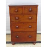A delightful short set of two over three mahogany drawers all with turned handles, 77cm wide,