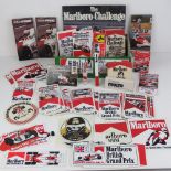 The Marlboro Challenge box containing a quantity of Marlboro Challenge ephemera including; stickers,