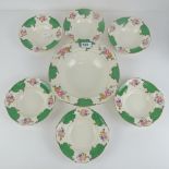 A Hoult & Co Sandringham pattern large dessert bowl with six matching small bowls all in a floral