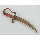 A 19 th century agate handled gilded paper knife and paper clip in the form of a sabre / sword ,