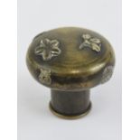 A c1900 Japanese Shakudo stick top / walking cane knop in brass having various applied symbols and