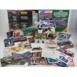 A large quantity of racing themed stickers and ephemera including; pen, clock, beer mats, coin,