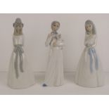 Three Lladro type standing lady figurines, one a/f.