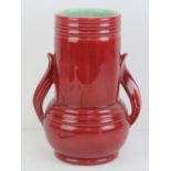 A Shorter & Son pottery vase numbered 646 to base, having mint green interior and red exterior,