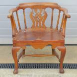19th century mahogany low back Windsor type armchair: a pair of front cabriole legs with decorative