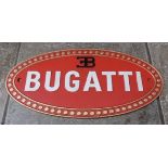 A fine and heavy 20th Century Bugatti-themed cast metal oval wall sign measuring 35 x 17.