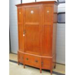 EA Taylor Arts and Crafts: a fruitwood wardrobe with inlaid Abalone,
