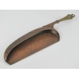 An Art Nouveau WMF crumb scoop made of copper and brass, marked with stamp verso.