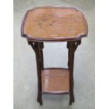 French Art Nouveau: in the manner of Jaques Majorelle (1886-1962) an inlaid two tier side table