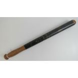 A Victorian truncheon having black ground with VR cypher and Special Constable under,