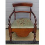 A late Victorian mahogany bar back commode chair with ceramic insert (freshly emptied).