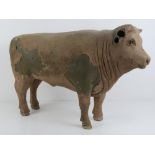 Butcher's shop advertising: a c1920 Butcher's advertising figure of a Steer / Bullock with buff