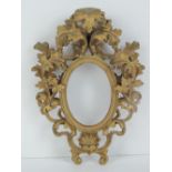 Florentine gilt miniature frame: a 19th century carved wooden and gilded frame with scallop shell