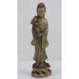 A carved soapstone Oriental figurine standing 17cm high, a/f.