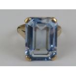 A large and impressive aquamarine cocktail ring in 9ct gold setting,