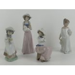 Four assorted Nao figurines, 16-26cm.