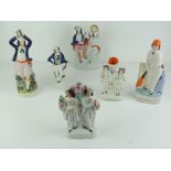 Six assorted Staffordshire flat back figurines, 17 - 28cm high.