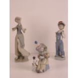 Three assorted Lladro figurines, 15-25cm high, fingers a/f.