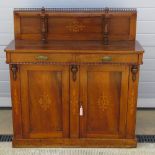 A short inlaid buffet sideboard having shaped shelf with galleried rail,