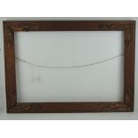 Arts and Crafts Frame: an oak frame with carved oak leaf and acorn applied decoration,