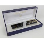 A set of Waterman pens being a fountain pen and a ball point, in presentation box.