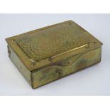 A German made brass stamp box, marked Ges Gesch to base, 8.5cm wide.