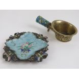 A brass and enamelled quatreform dish decorated with dragonflies and flowers upon, 12cm dia.