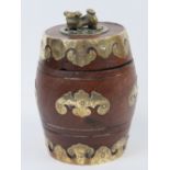 A delightful Oriental hardwood lidded barrel profusely decorated with gilt brass adornments and Fo
