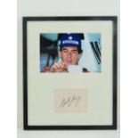 Ayrton Senna; hand-signed autograph on card in photographic montage. Measuring 36 x 30cm.