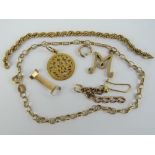 A quantity of yellow metal items including initialled charm engraved 7 July 1887, 2.6g, 'M' charm 1.