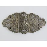 A late Victorian HM silver belt buckle of floral form having central cherub head and wings,