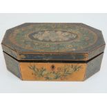 An elongated octagonal playing cards box, 22cm wide.