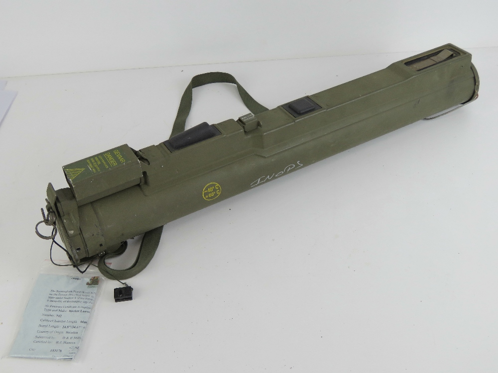 A deactivated M72 LAW 66mm Rocket Launcher, opens and closes, with sights, end cap and carry strap.