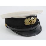 A WWII Japanese Marine peaked cap.