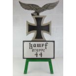 A military re-enactment prop 'WWII German' display stand, 110cm high, chip to wing of eagle.