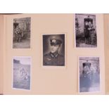 A WWII German straw marquetry photograph album including photos of artillery,