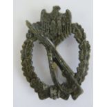 A WWII German Infantry Assault badge.