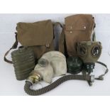 Polish and Hungarian Cold War gas masks with bags.