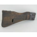 A WWII MP44 wooden shoulder stock.