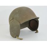 A WWII US Army Air Corps/Force M3 Bomber Crew Flak helmet with built in liner.