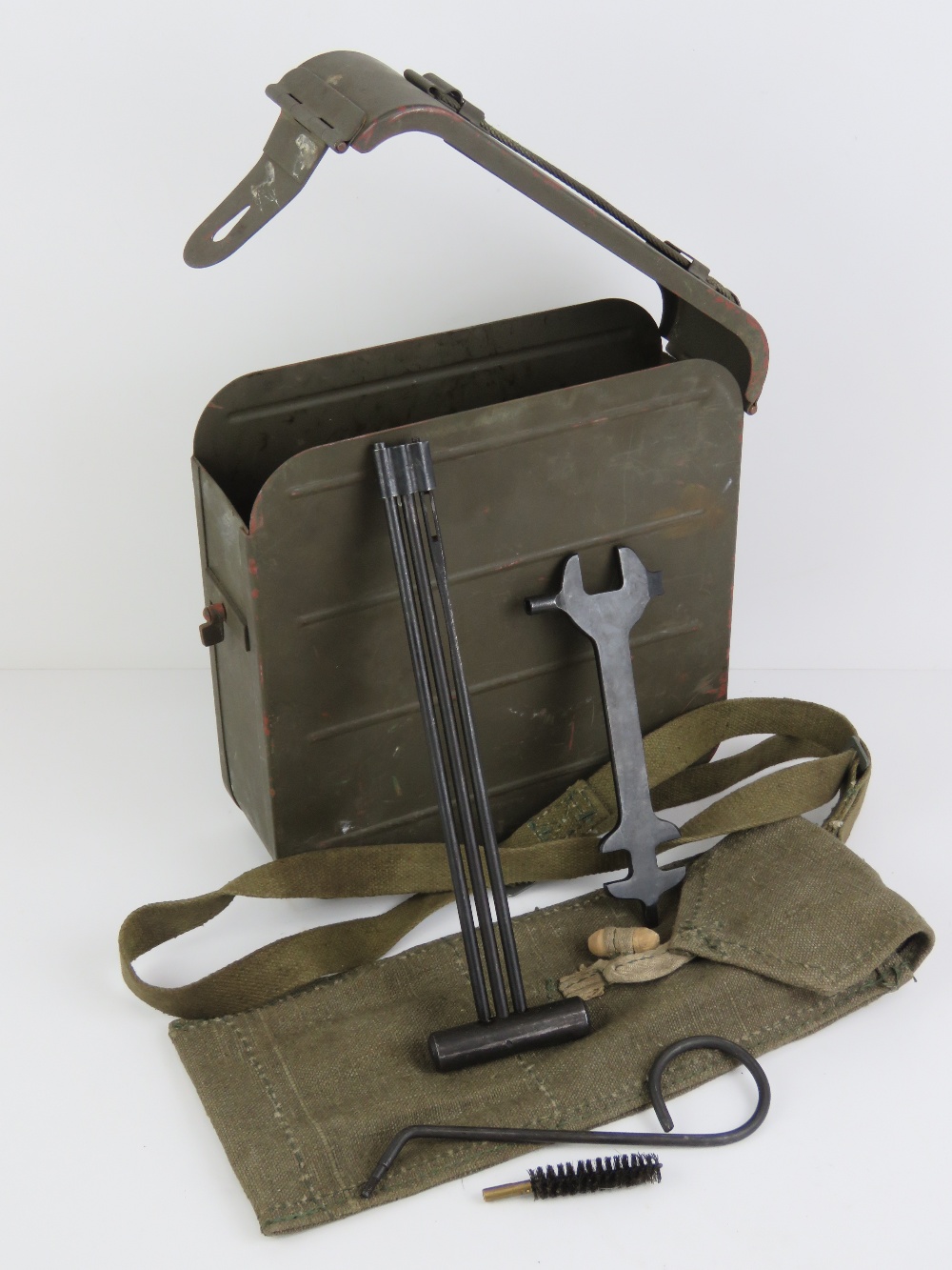 A WWII Russian Maxim ammo tin, together with a gunners kit.