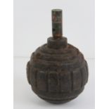 An inert WWI German Kugel grenade with fuse.